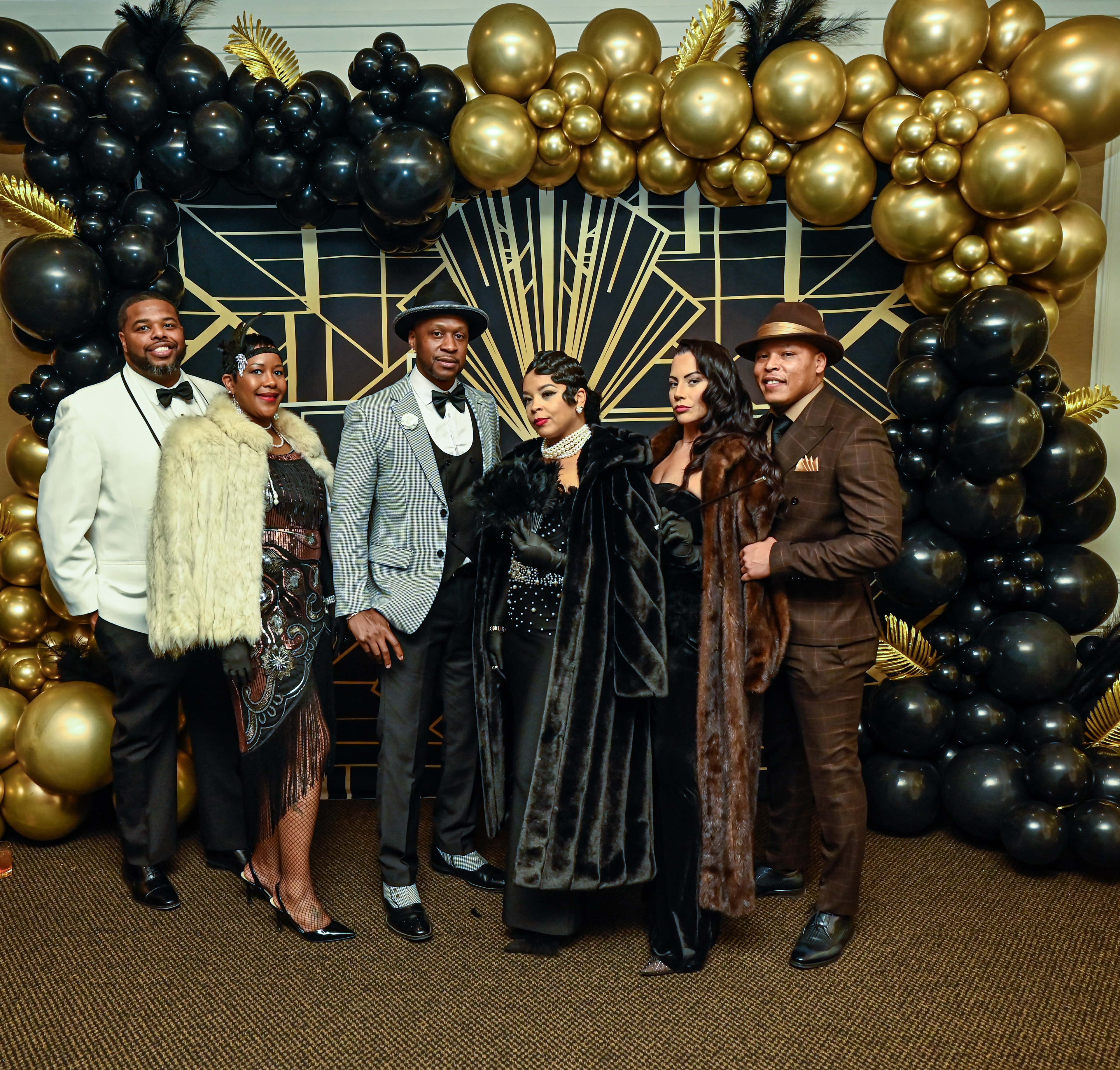 Gala attendees in formal attire